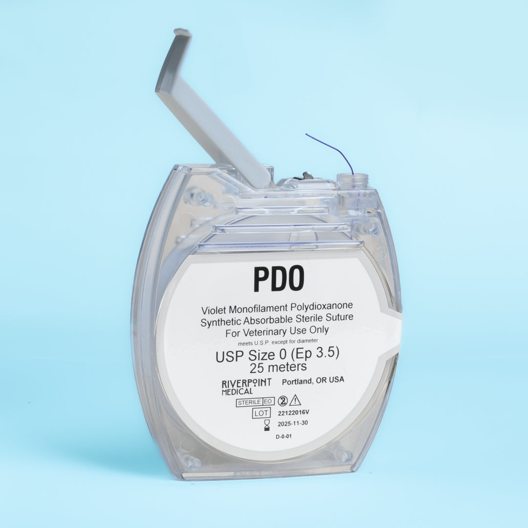 A clear package of PDO suture size 0 (Ep 3.5), showing a 25m violet monofilament thread made of polydioxanone for veterinary use. The label emphasizes its absorbable nature, extended wound support of 6 weeks, and compliance with USP & EP standards. Manufactured by RIVERPOINT in Portland, OR, USA, highlighting its premium quality and suitability for various surgical applications.