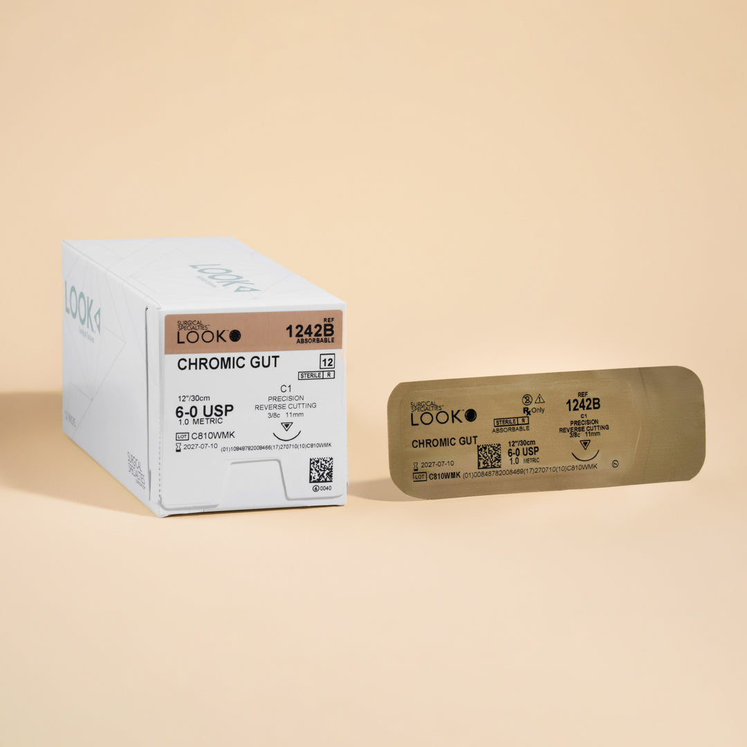 Box of 6-0 Chromic Gut sutures with a C1 precision reverse cutting needle, model 1242B, emphasizing the 2-week wound support duration and featuring a QR code for easy reference. The packaging highlights its sterility and absorbable nature tailored for delicate surgical procedures.