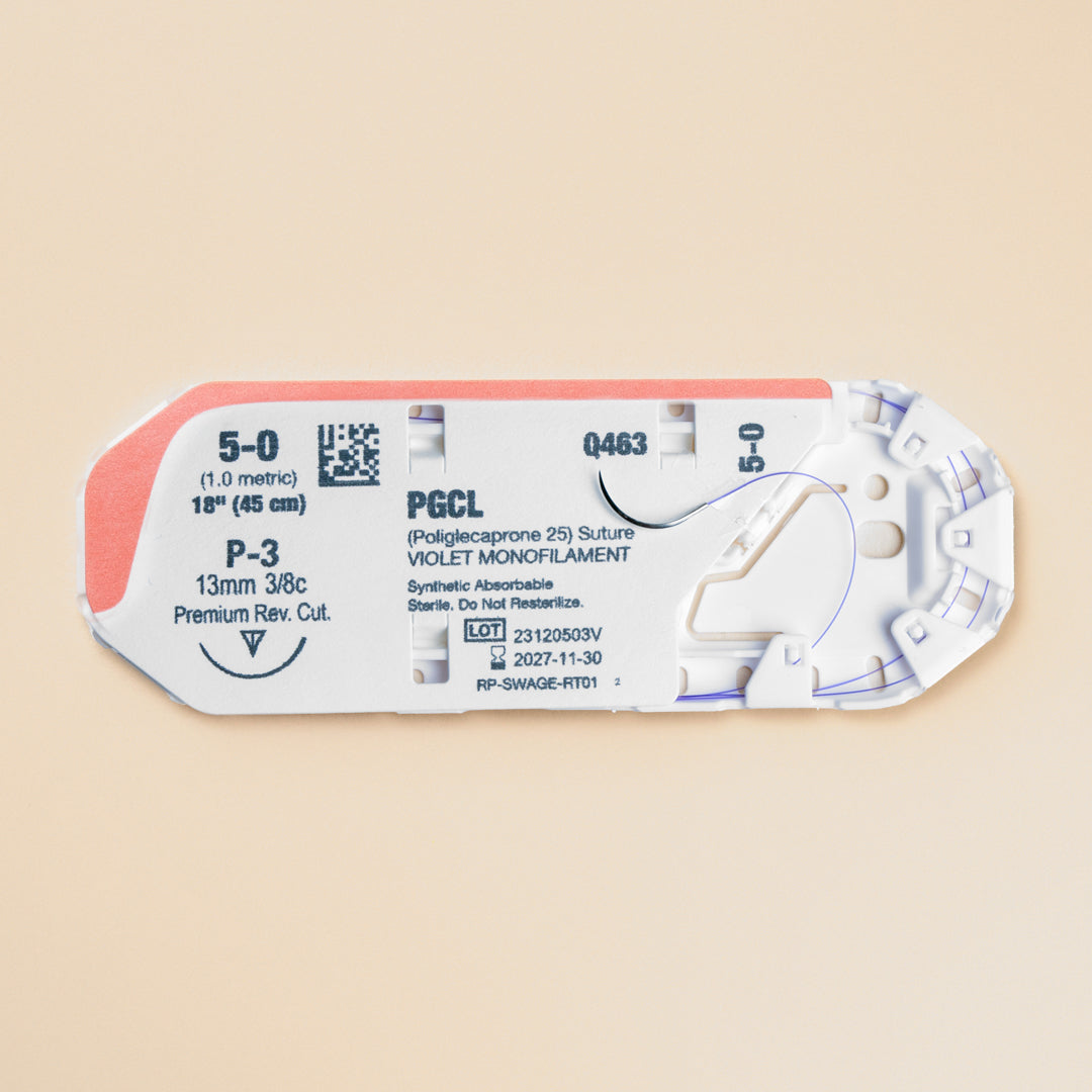 A box and individual packaging of 5-0 MONOPRO violet monofilament sutures, with an 18-inch P-3 premium reverse cutting needle. The box, labeled PM463, highlights the suture's absorbable nature and is specifically marked for veterinary use only. The packaging is designed to ensure sterility and includes detailed product specifications for easy reference, making it an essential tool for veterinary professionals requiring high-quality, reliable suturing materials.