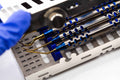Stainless steel papilla tunneler, long #4 — a periosteal elevator for tunneling and reflecting soft tissue in periodontal surgery.